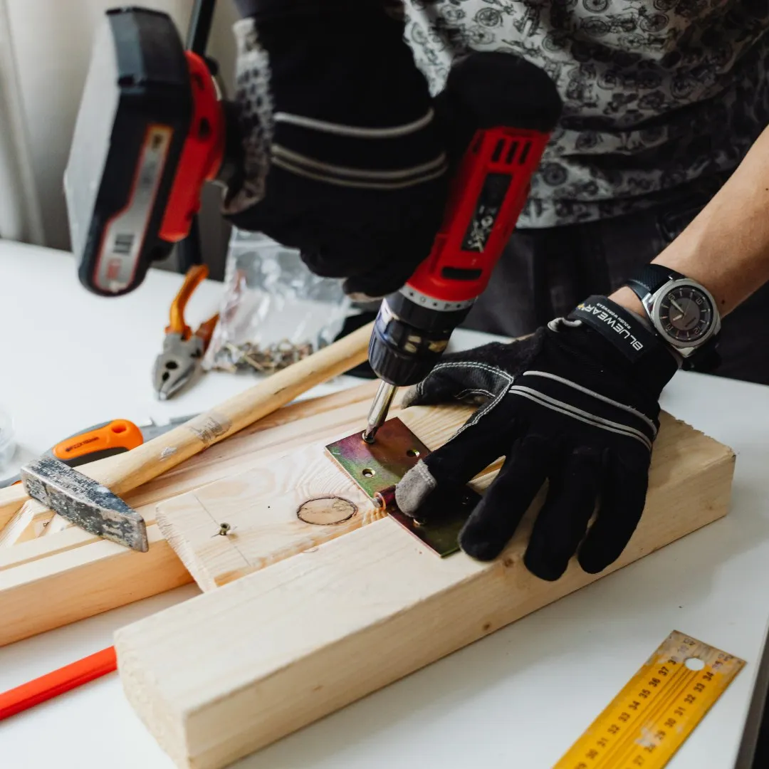 Drilling into a wood board for a mounting project