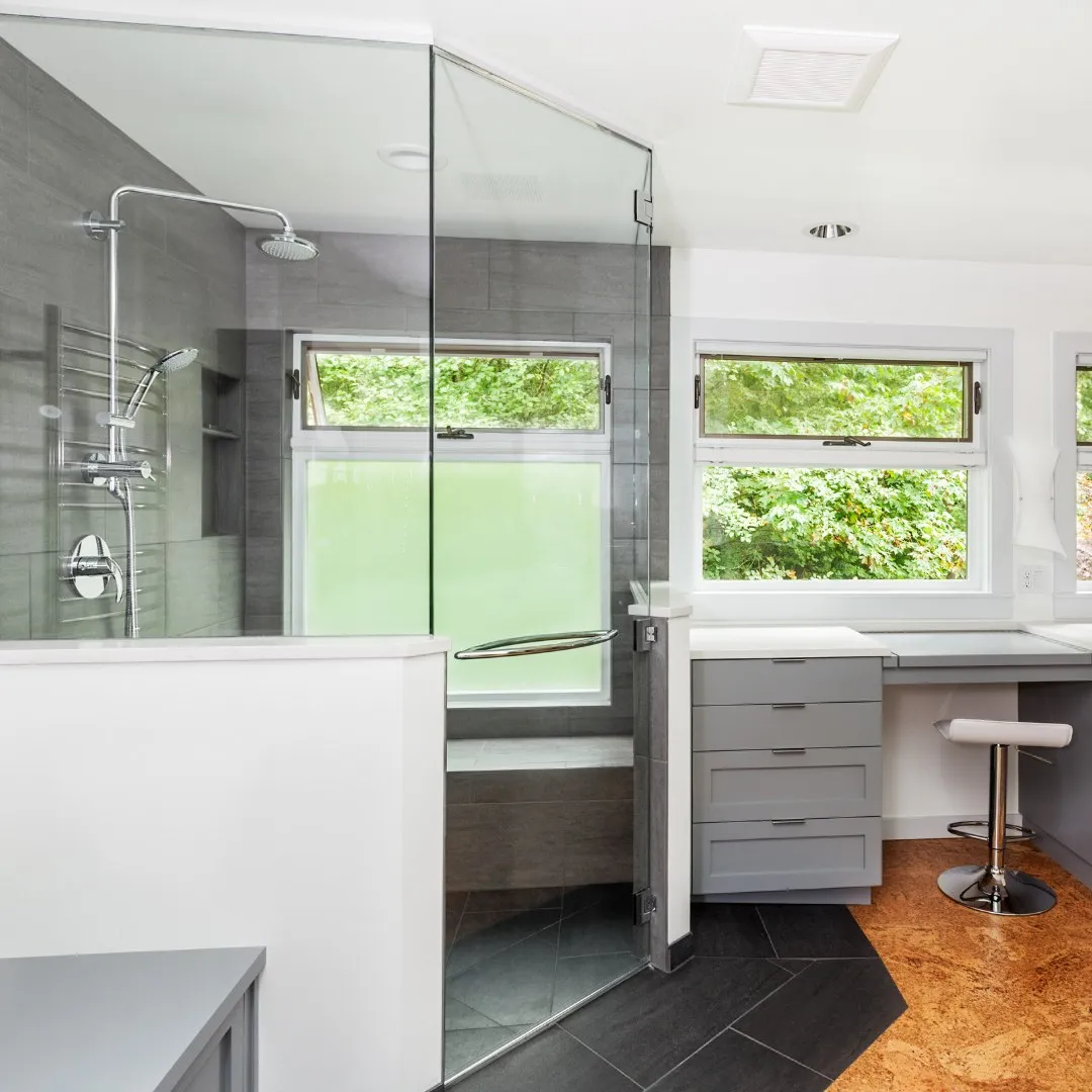 Bathroom with a glass shower enclosure and vanity