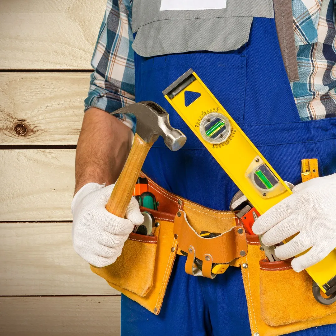 Tool belt, hammer and level ready for a wall install